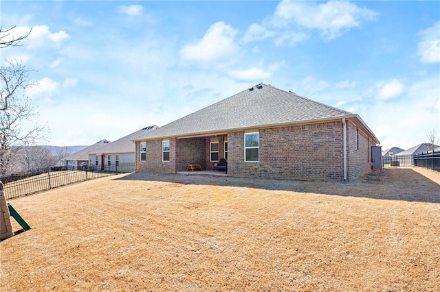 back of property featuring a patio