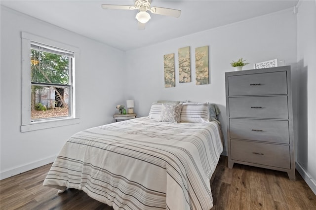 bedroom featuring ceiling fan and hardwood / wood-style flooring