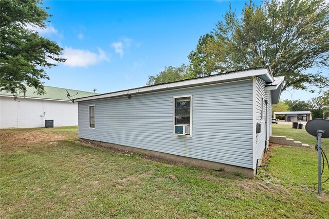 156 Main, Colcord, OK 74338 - view of side of home featuring a yard
