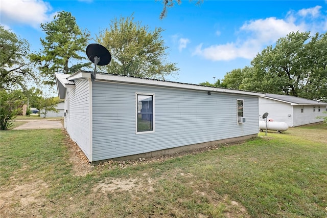 back of house with a yard