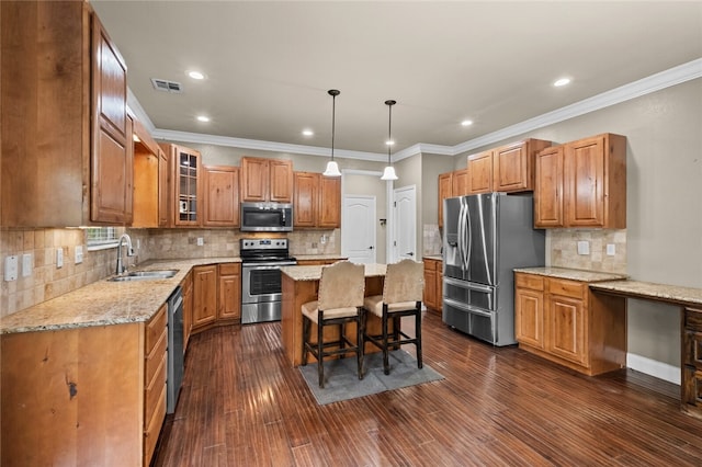 kitchen with appliances with stainless steel finishes, dark hardwood / wood-style flooring, sink, and backsplash