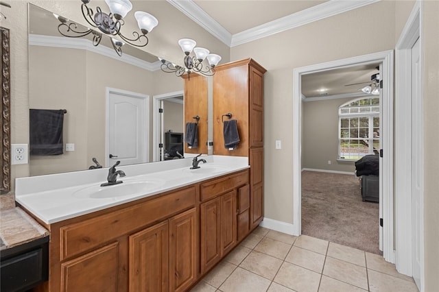 bathroom with crown molding, double sink vanity, ceiling fan with notable chandelier, and tile patterned flooring