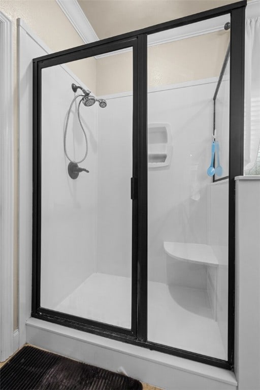 bathroom featuring an enclosed shower