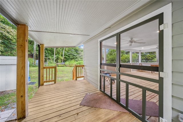 wooden deck with ceiling fan