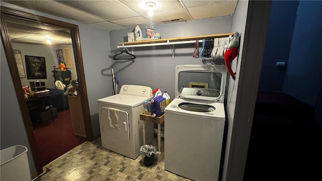 laundry area with washing machine and dryer