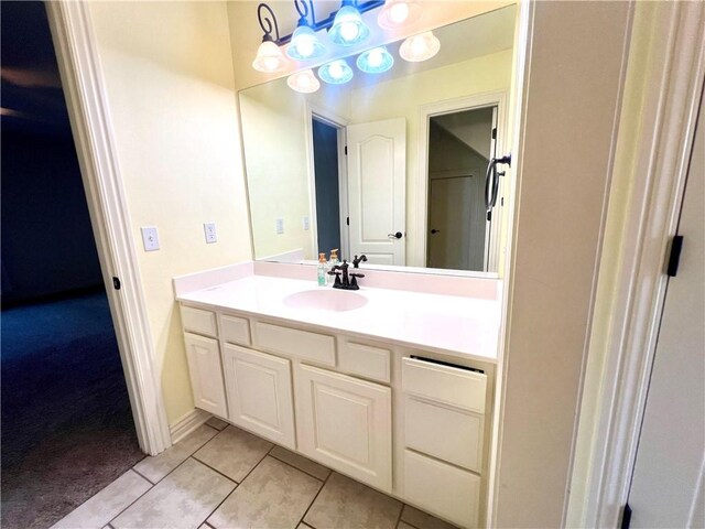 bathroom with vanity and tile patterned floors