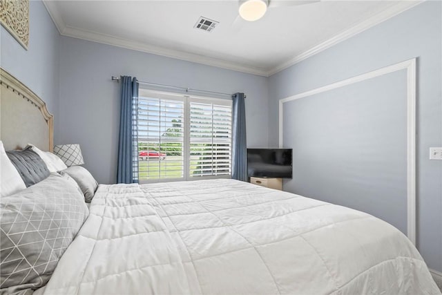 bedroom featuring crown molding