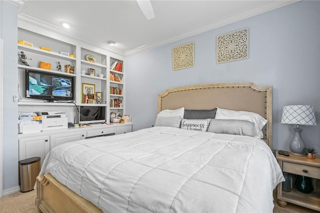 carpeted bedroom with ceiling fan and crown molding