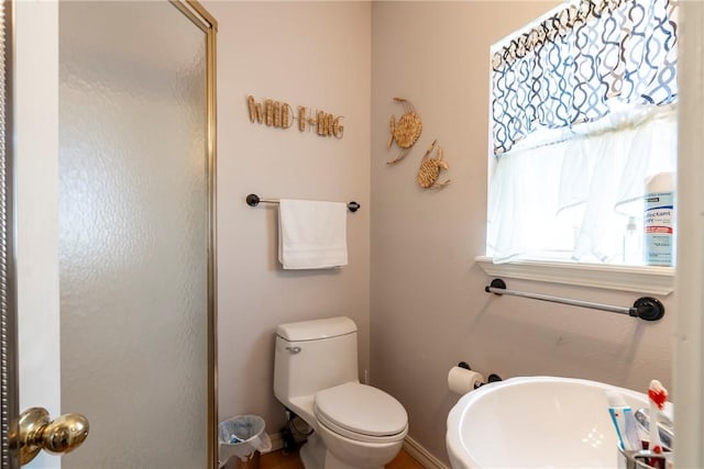 bathroom featuring toilet