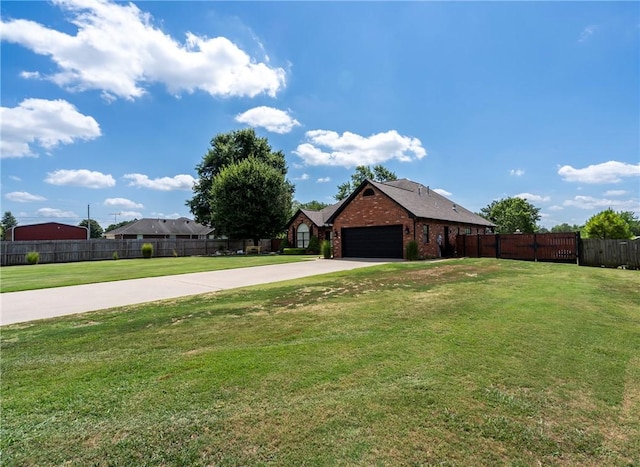 exterior space featuring a garage and a front lawn