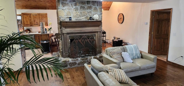 living room featuring hardwood / wood-style flooring and a fireplace