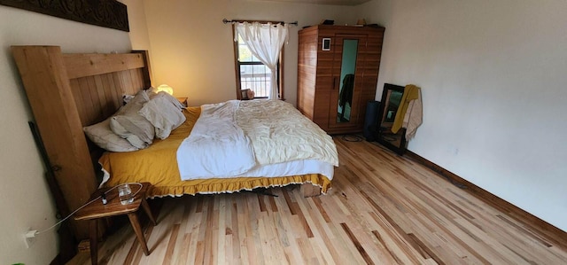 bedroom featuring light hardwood / wood-style floors