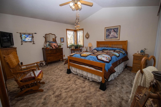 bedroom with ceiling fan, vaulted ceiling, and carpet