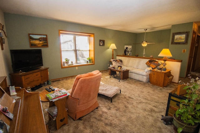 living room featuring carpet floors and ceiling fan