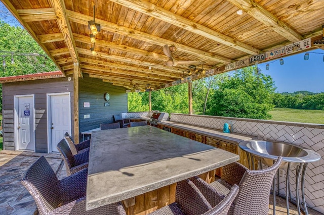 view of patio / terrace featuring exterior bar and grilling area