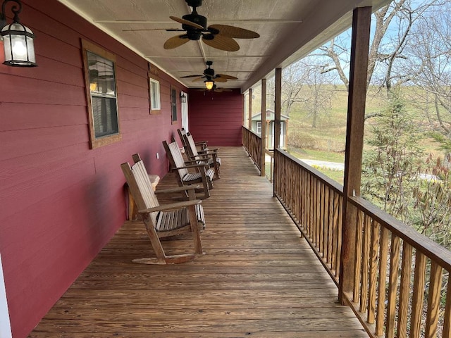 wooden terrace with ceiling fan