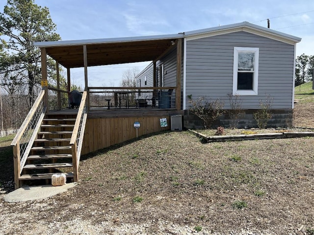 exterior space with a wooden deck