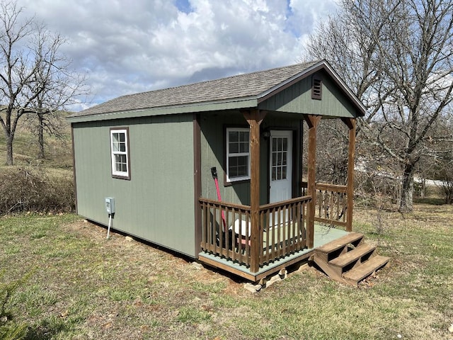 view of outdoor structure with a lawn