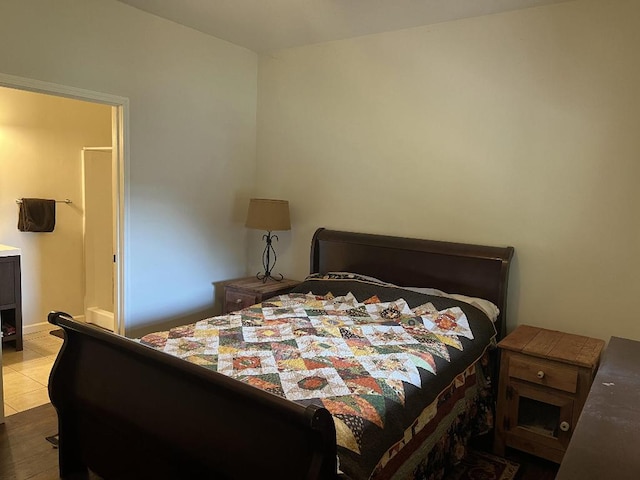 bedroom with light wood-type flooring