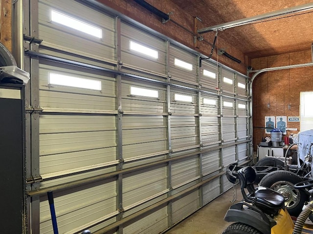 garage with wood walls