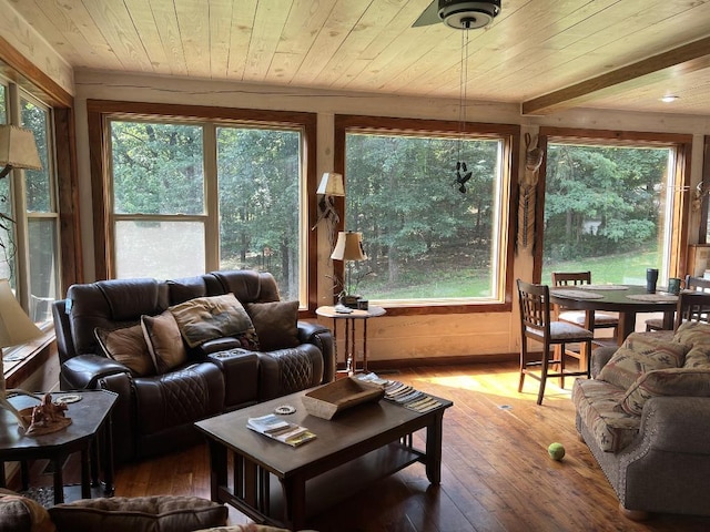 sunroom with wooden ceiling and a healthy amount of sunlight