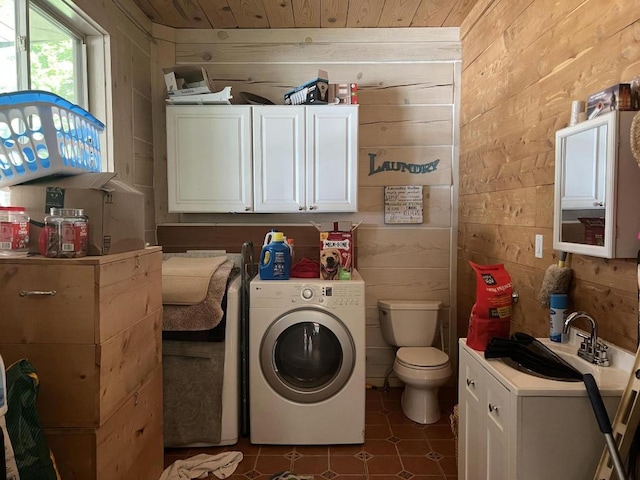 washroom featuring washer / clothes dryer, wooden walls, sink, and wood ceiling