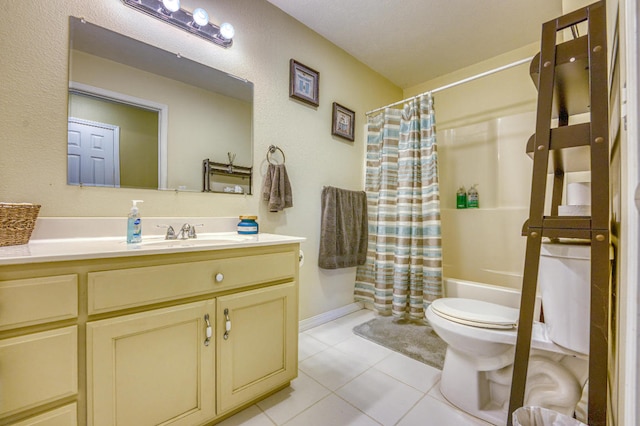 full bathroom featuring toilet, vanity, shower / bath combo with shower curtain, and tile patterned floors