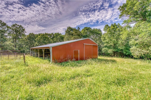 view of outdoor structure featuring a rural view