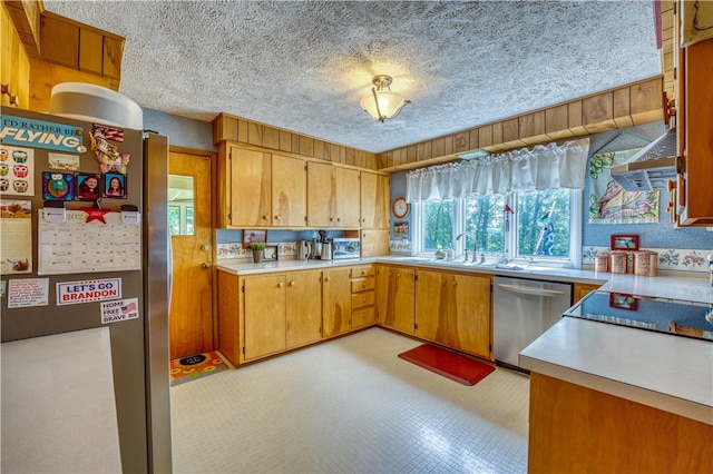 kitchen featuring appliances with stainless steel finishes and a textured ceiling