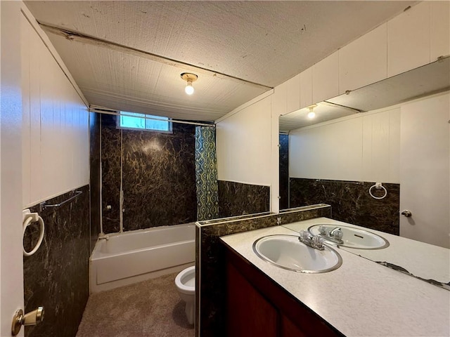 full bathroom with a textured ceiling, toilet, shower / bath combo, wood walls, and vanity