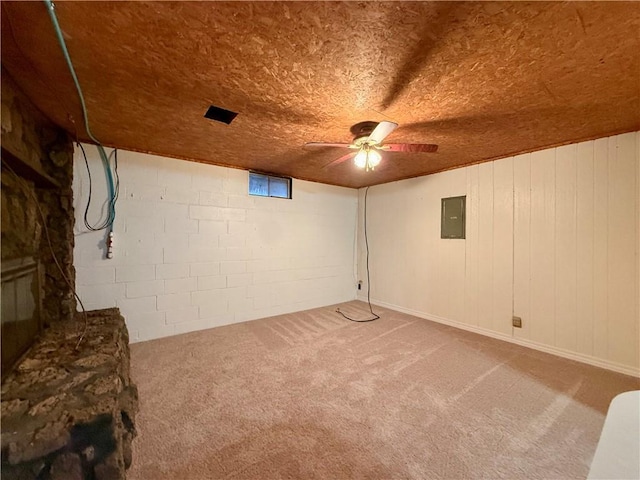 basement with electric panel, ceiling fan, wood ceiling, and carpet