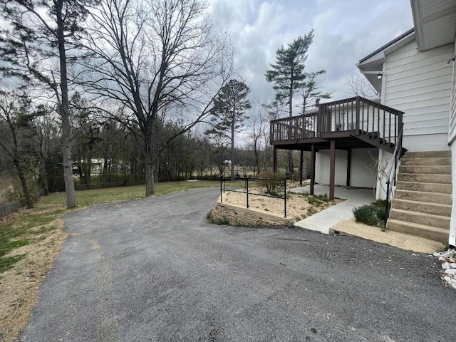 exterior space featuring a wooden deck