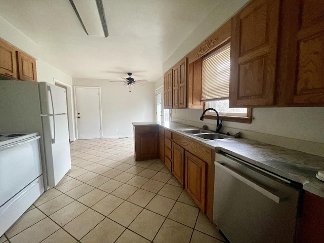 kitchen with ceiling fan, electric range oven, stainless steel dishwasher, sink, and light tile patterned flooring