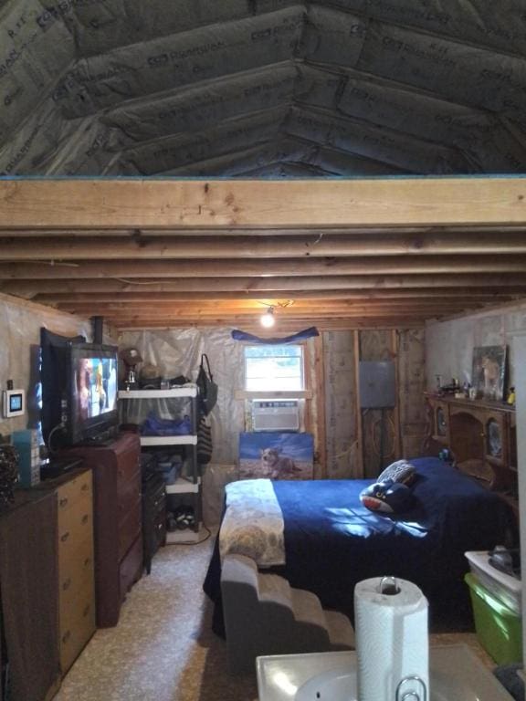 bedroom featuring vaulted ceiling