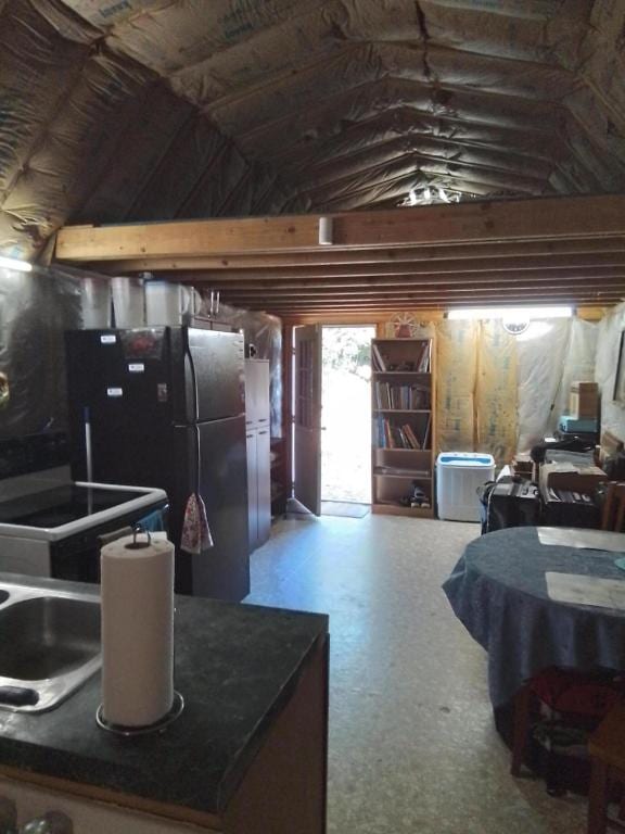 interior space with black fridge