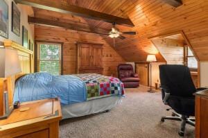 bedroom with wood ceiling, carpet flooring, vaulted ceiling with beams, and wood walls