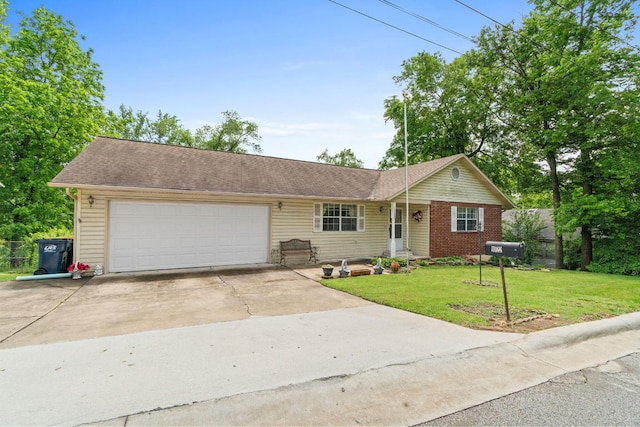 single story home with a front lawn and a garage