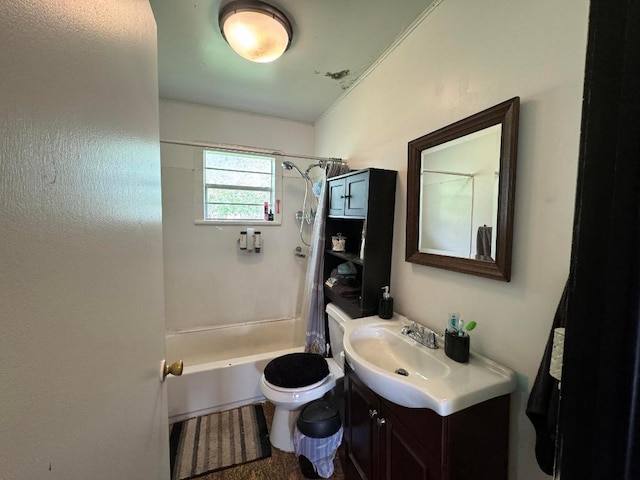 full bathroom featuring toilet, washtub / shower combination, and vanity