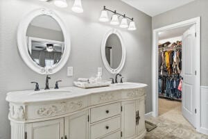 bathroom with vanity and tile patterned floors