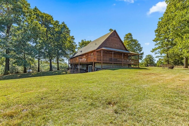 view of yard with a wooden deck