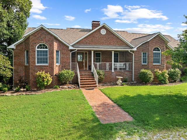 view of front of home with a front lawn and a porch