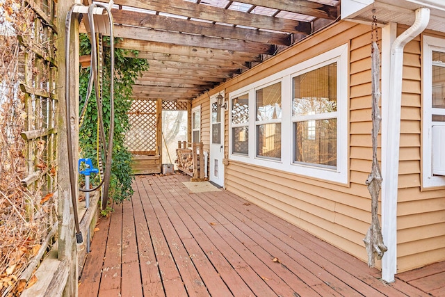 wooden deck featuring a pergola