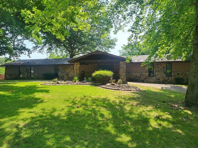 403 Normandy St, Harrison, AR 72601 - back of house with stone siding and a lawn