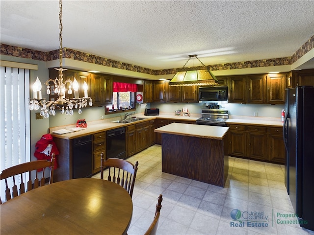 kitchen with an inviting chandelier, black appliances, sink, decorative light fixtures, and a center island