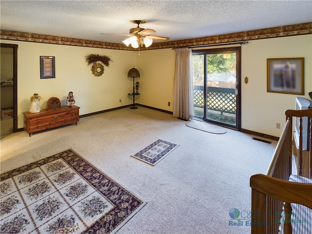 403 Normandy St, Harrison, AR 72601 - interior space with light carpet, ceiling fan, and a textured ceiling