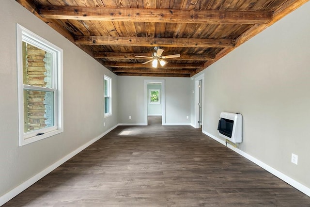 interior space featuring beamed ceiling, heating unit, and wooden ceiling