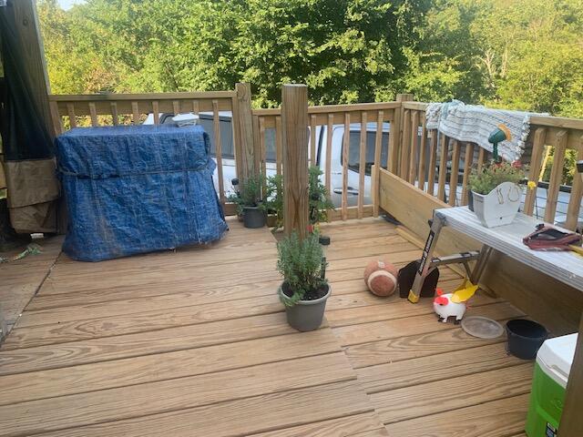 wooden terrace with grilling area