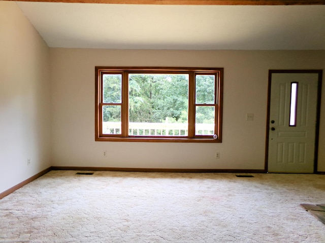 view of carpeted spare room