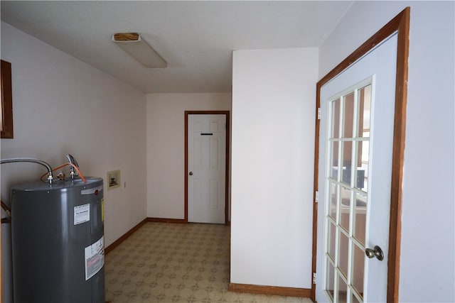 interior space featuring hookup for a washing machine and electric water heater