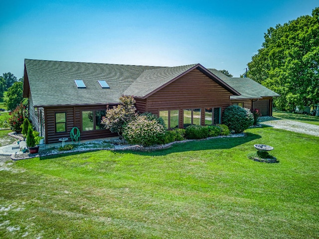 log-style house featuring a front lawn